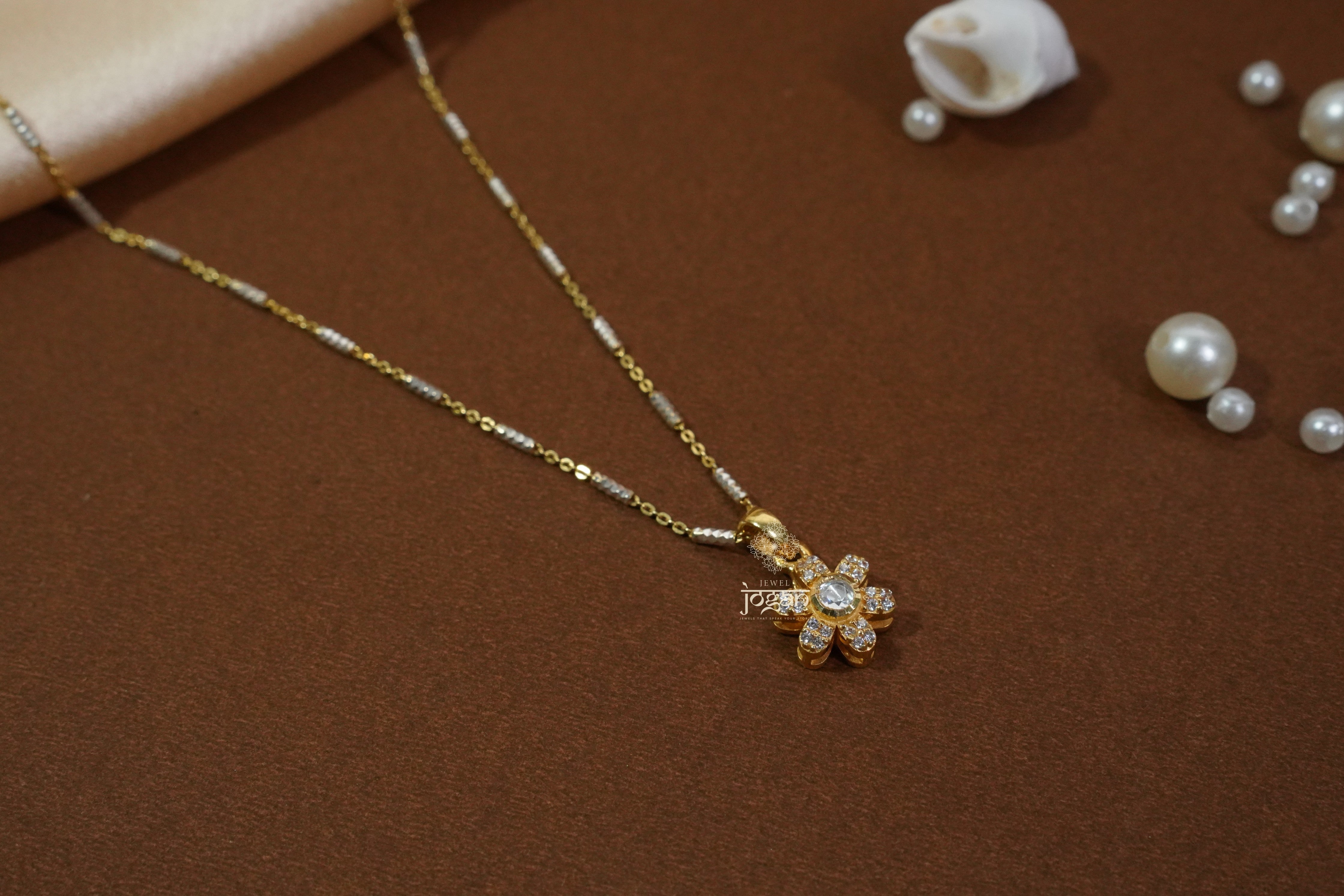 Gold-plated silver pendant, floral motif with lab grown polki and CZ stones, openwork details