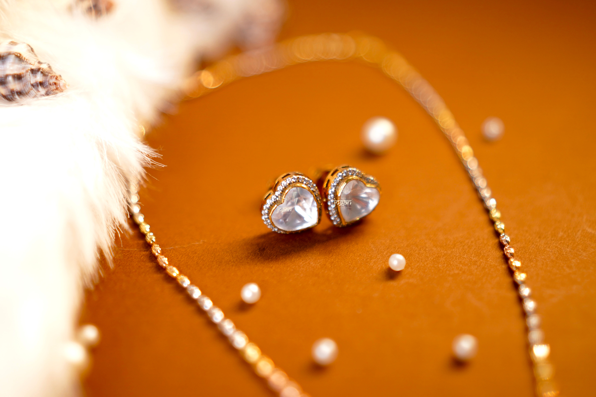 Heart-shaped gold-plated silver stud earrings with lab grown polki and CZ stones.
