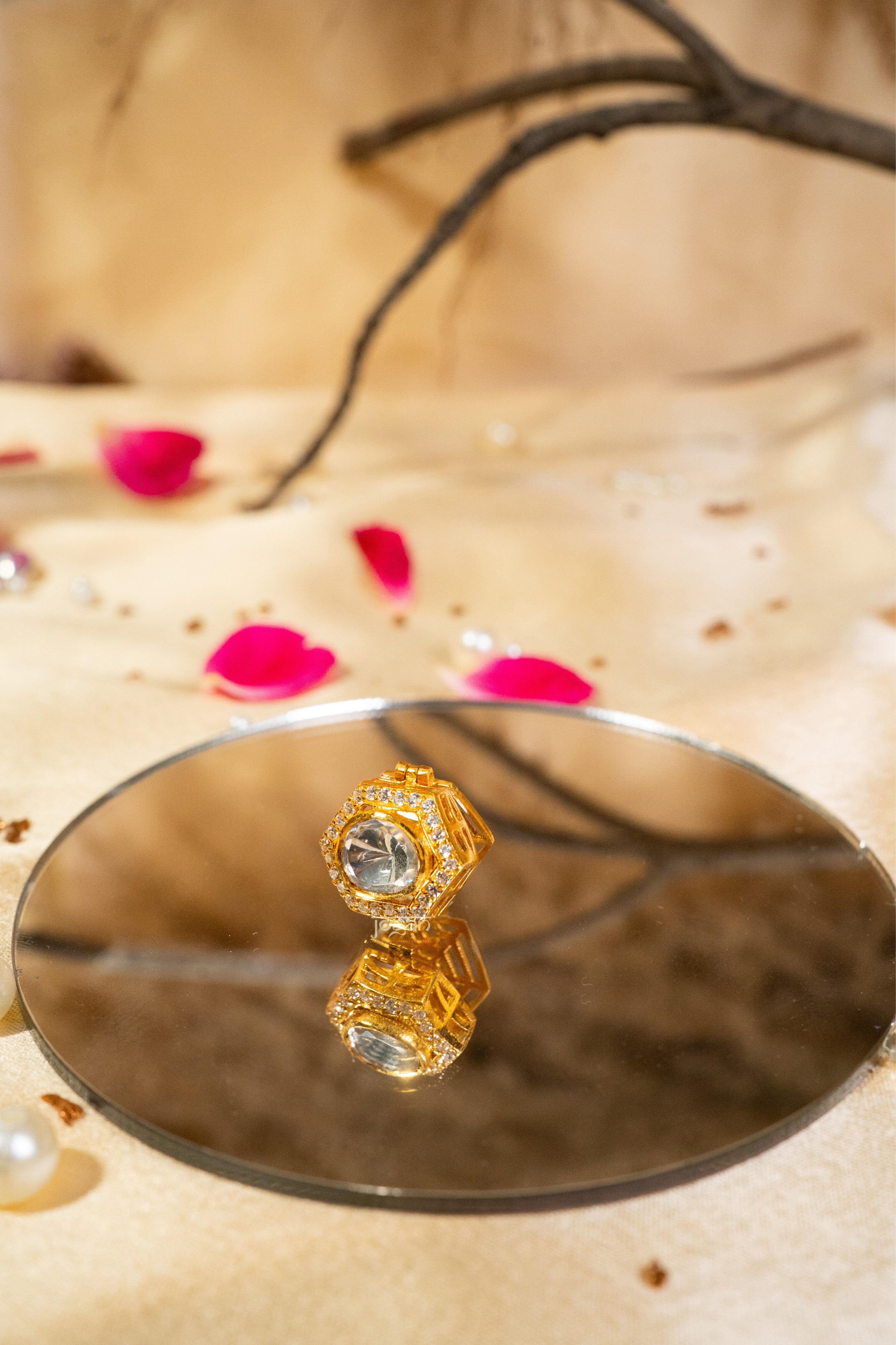 Shatkoni signature six-sided button cover symbolizing masculinity, balance, and strength.