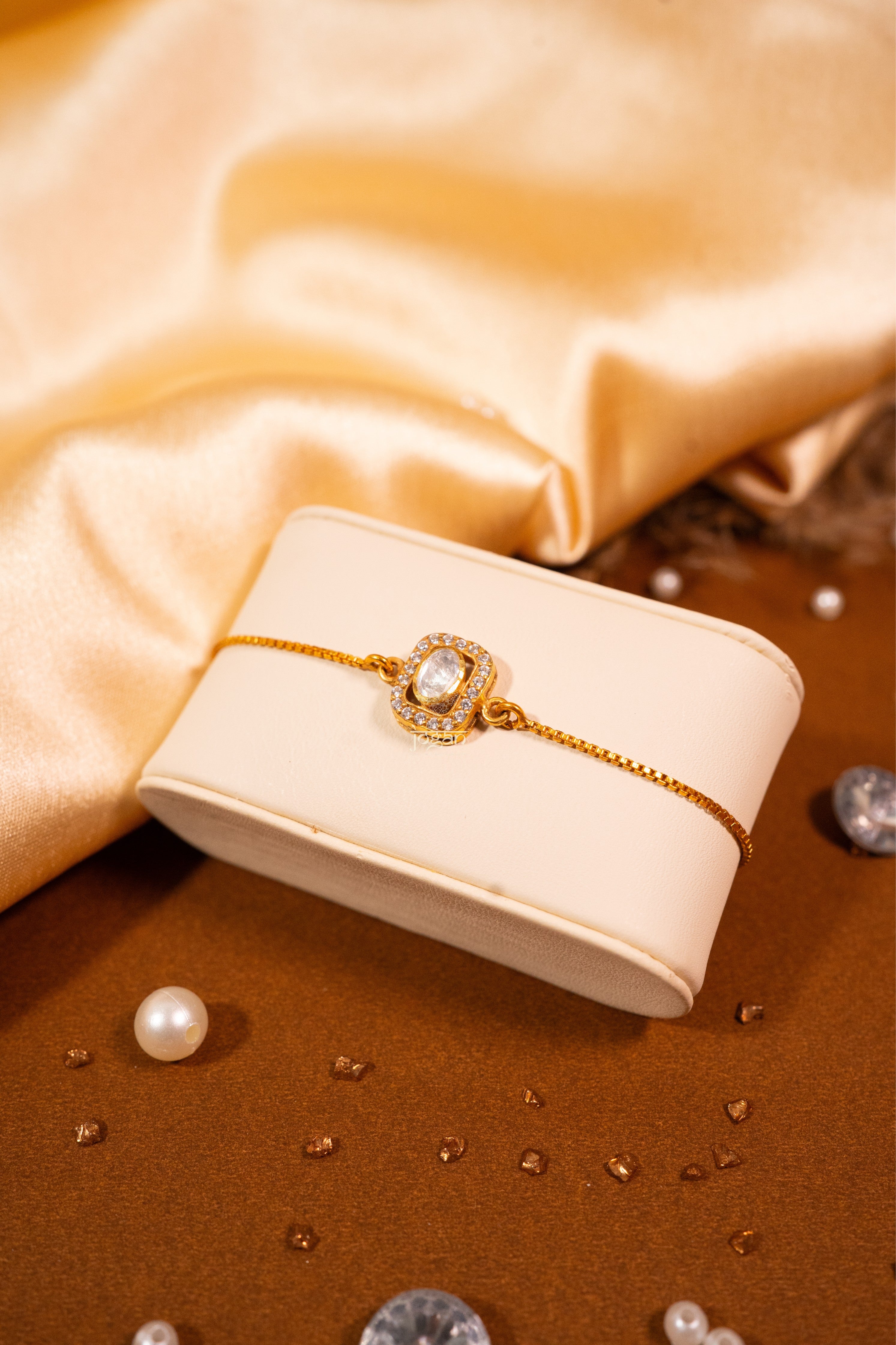 Gold-plated 92.5 sterling silver adjustable bracelet with lab grown polki and CZ stones, oval polki halo design.
