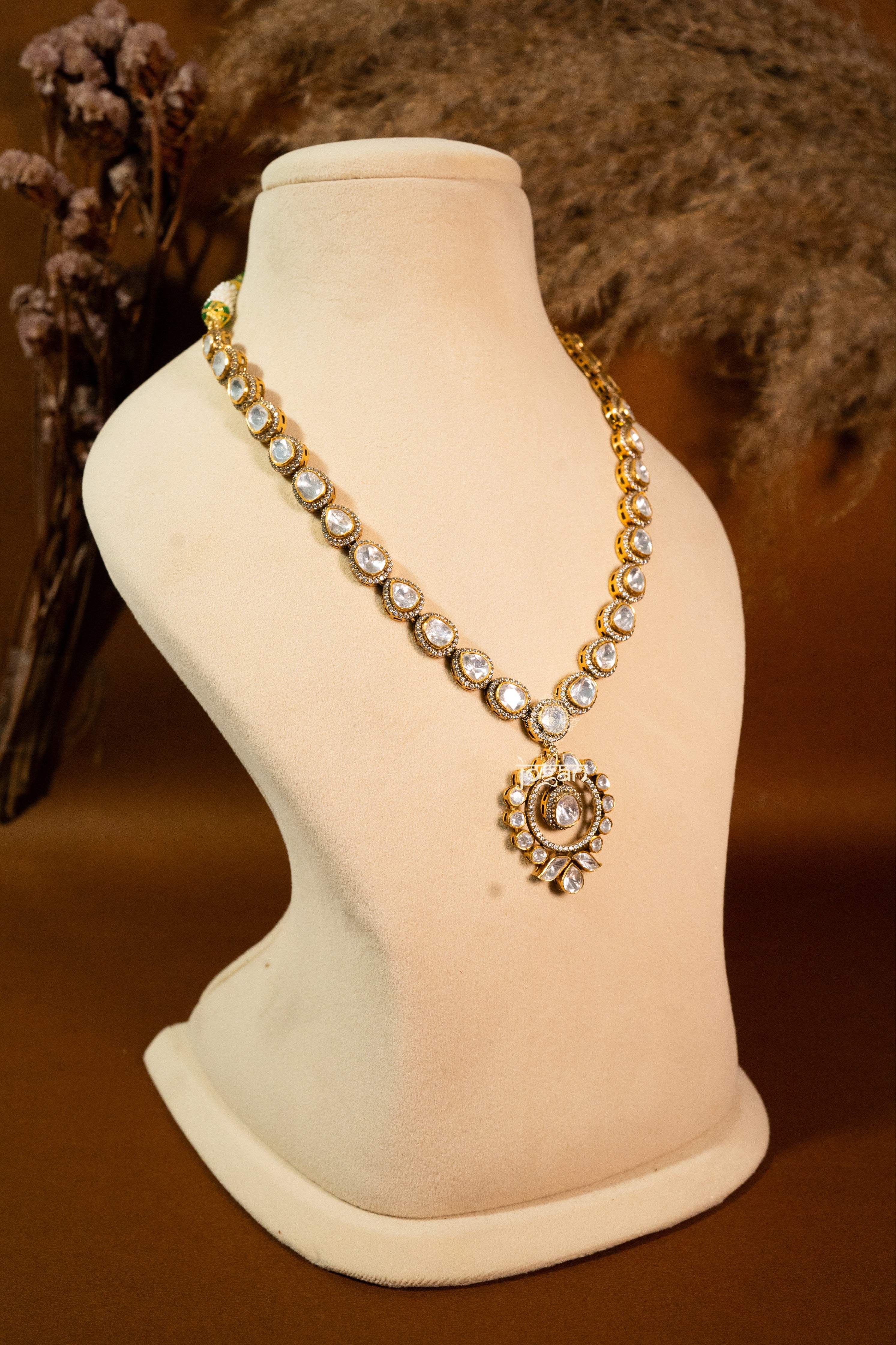 Vasundhara necklace set with lab grown polki stones and gold-plated 92.5 sterling silver, featuring detailed Indian floral motifs and intricate craftsmanship.