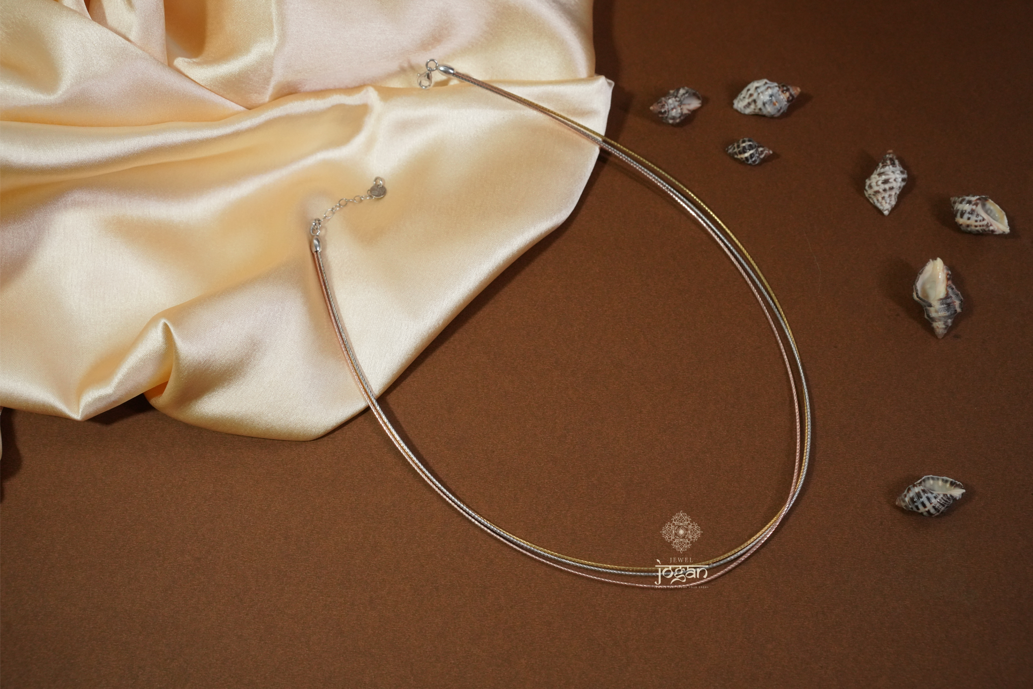 Italian-made tri-color hasli chain in gold, rose, and rhodium tones, perfect for layering or wearing solo.