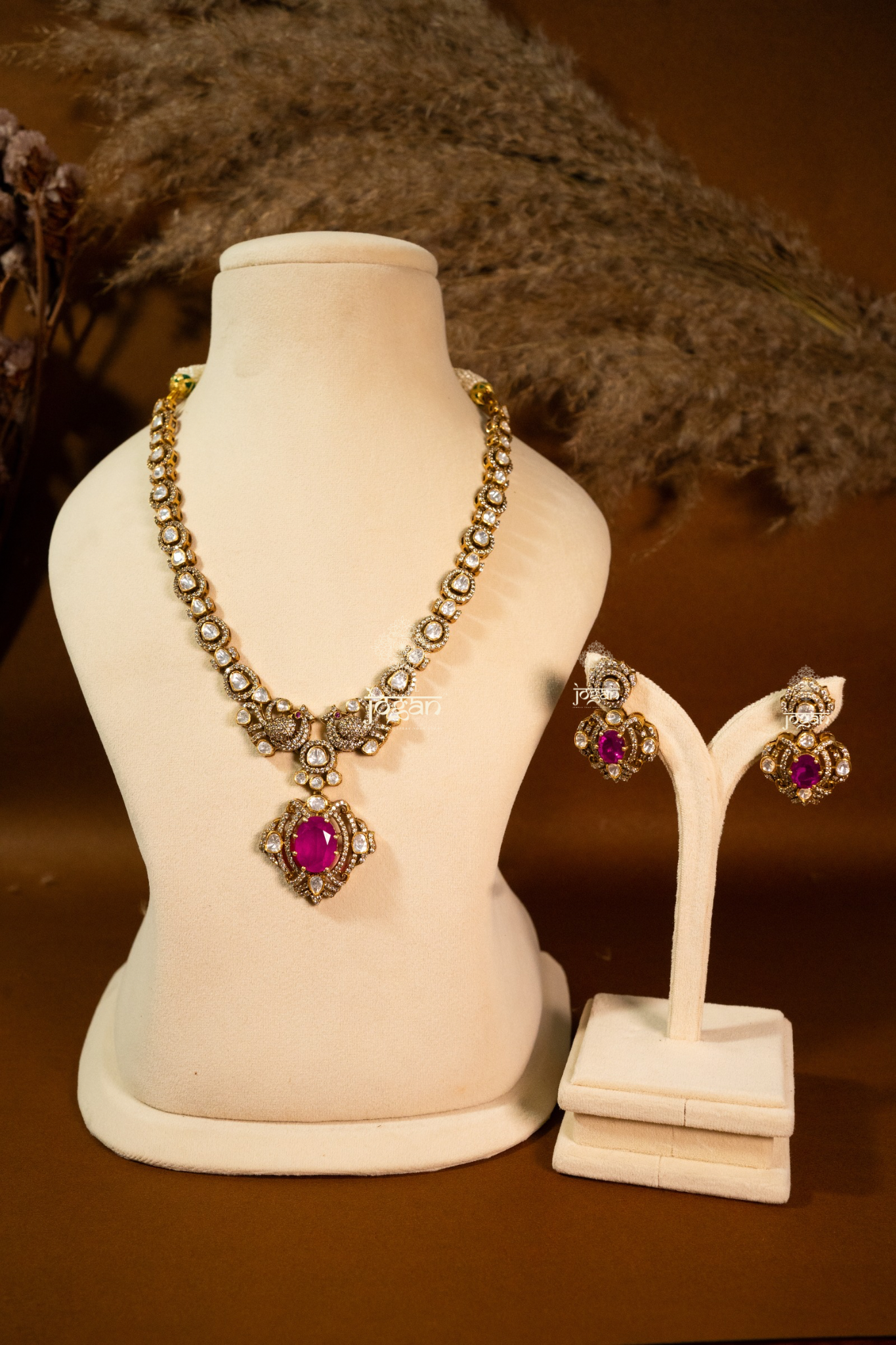 Manikya Durbaar necklace set featuring ruby-toned semi-precious centerpiece, framed with CZs and lab-grown Polkis in gold finish — ideal for weddings, festivities, and Indo-western looks.