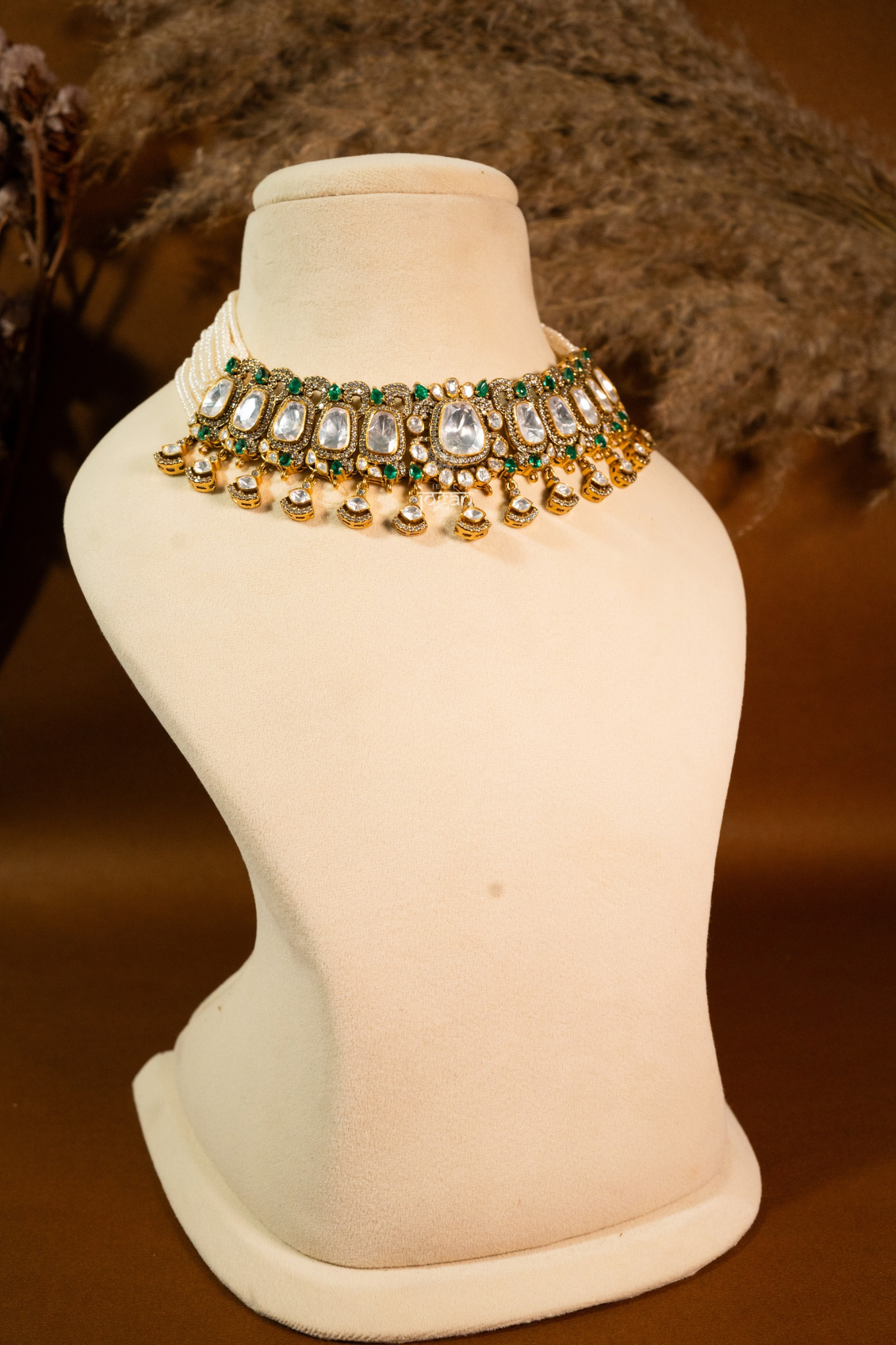 Sitabani Necklace Set by Jewel Jogan — handcrafted choker necklace and matching earrings in 92.5 sterling silver with gold plating. Features lab-grown polkis and emerald-toned semi-precious stones, offering a regal green-and-gold look. Perfect for brides, wedding guests, and festive occasions seeking traditional yet contemporary elegance.