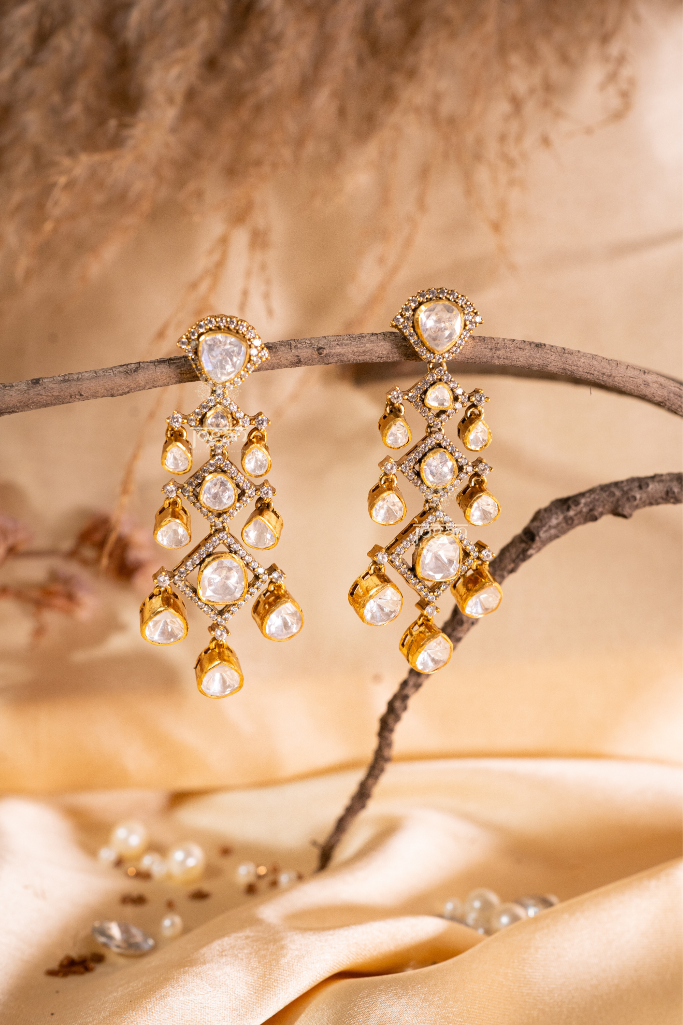 Kanak Priya statement dangler earrings featuring square and pear-shaped Polkis framed with CZs and drop details, perfect for weddings and festive wear.